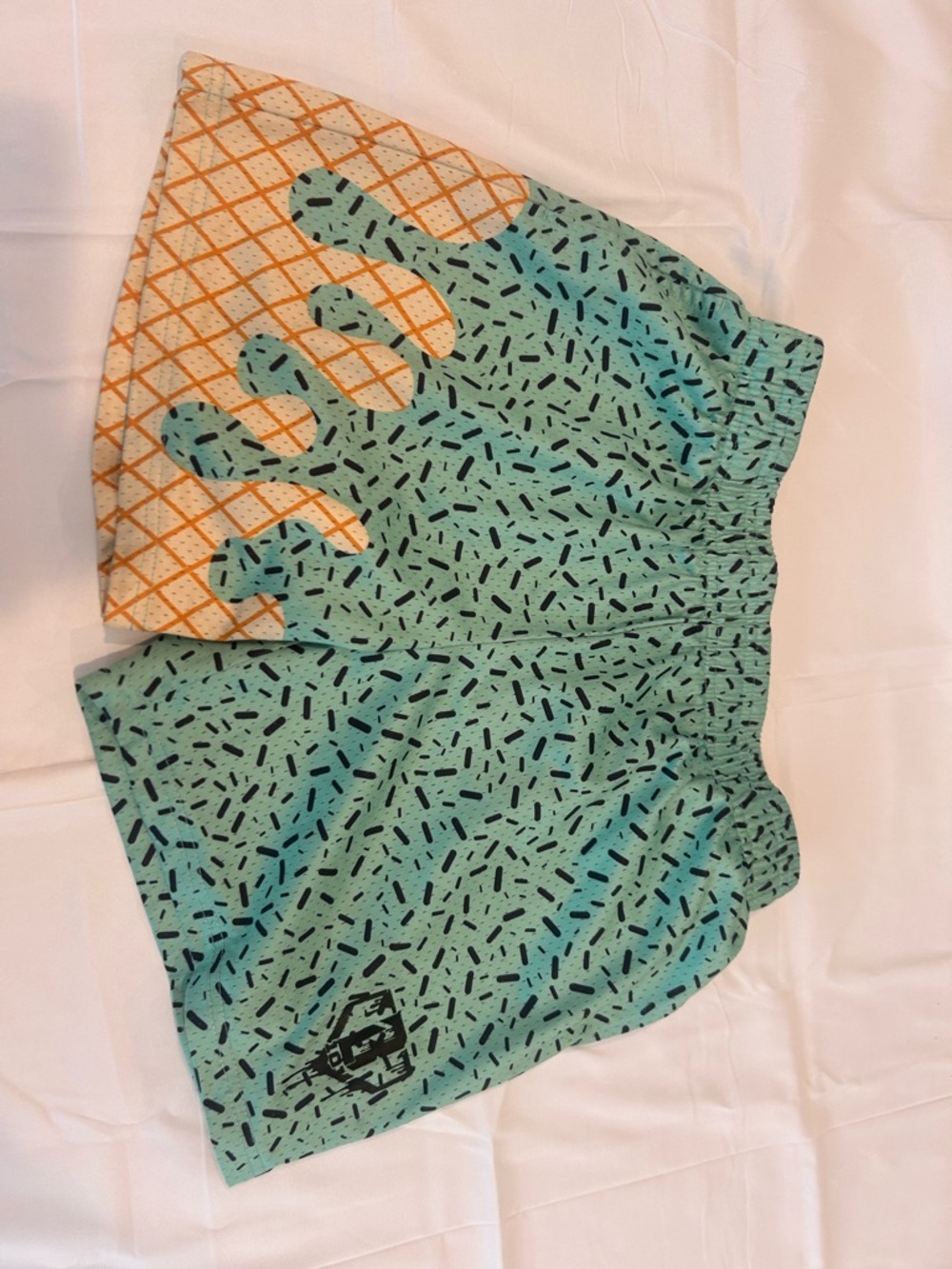 Kids Mint Green Patterned Shorts with Orange Grid Accent